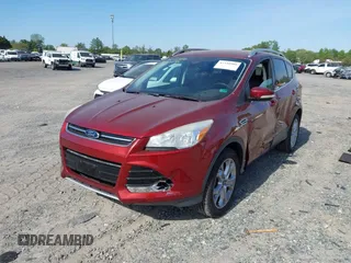2016 Ford Escape Titanium with VIN 1FMCU9JX9GUA16892, listed as a IAAI auction lot 42110986 with 87,775 mi miles and . Bid and sale history available at DreamBid. Image 17.