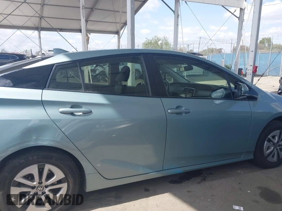 2016 Toyota Prius Four z VIN JTDKARFU8G3026830, wystawiony jako IAAI lot #41915928 z przebiegiem 64 409 mil mil oraz . Historia ofert i sprzedaży dostępna na DreamBid. Obrazek 13.