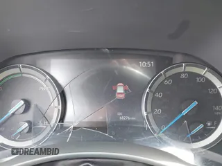2021 Toyota Highlander Hybrid XLE z VIN 5TDHARAH4MS006945, wystawiony jako IAAI lot #42381038 z przebiegiem 68 276 mil mil oraz . Historia ofert i sprzedaży dostępna na DreamBid. Obrazek 7.