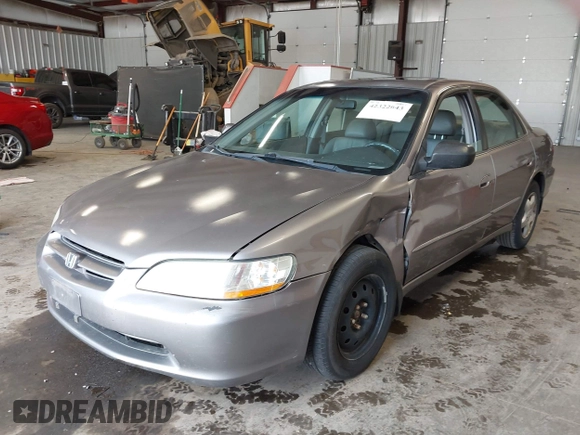 2000 Honda Accord EX z VIN 1HGCG1657YA053433, wystawiony jako IAAI lot #42322643 z przebiegiem 146 517 mil mil oraz . Historia ofert i sprzedaży dostępna na DreamBid. Obrazek 2.