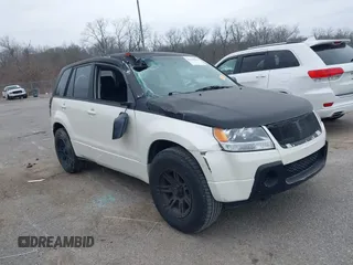 2006 Suzuki Grand Vitara z VIN JS3TE941064100737, wystawiony jako IAAI lot #41598940 z przebiegiem Nie podano mil oraz . Historia ofert i sprzedaży dostępna na DreamBid. Obrazek 1.