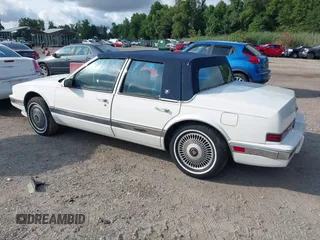 1991 Cadillac Seville z VIN 1G6KS53B9MU820155, wystawiony jako IAAI lot #40035441 z przebiegiem 78 021 mil mil oraz . Historia ofert i sprzedaży dostępna na DreamBid. Obrazek 3.