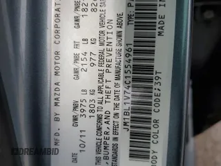 2012 Mazda 3 i Touring z VIN JM1BL1V74C1554961, wystawiony jako Copart lot #55955615 z przebiegiem 146 764 mil mil oraz Szkoda całkowita • Salvage title. Historia ofert i sprzedaży dostępna na DreamBid. Obrazek 12.