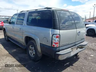 2004 Chevrolet Suburban Z71 z VIN 3GNFK16Z94G210623, wystawiony jako IAAI lot #42227673 z przebiegiem 183 831 mil mil oraz . Historia ofert i sprzedaży dostępna na DreamBid. Obrazek 3.