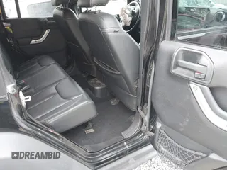 2015 Jeep Wrangler Unlimited Rubicon Hard Rock with VIN 1C4HJWFG6FL757421, listed as a IAAI auction lot 42107514 with 63,997 mi miles and . Bid and sale history available at DreamBid. Image 8.
