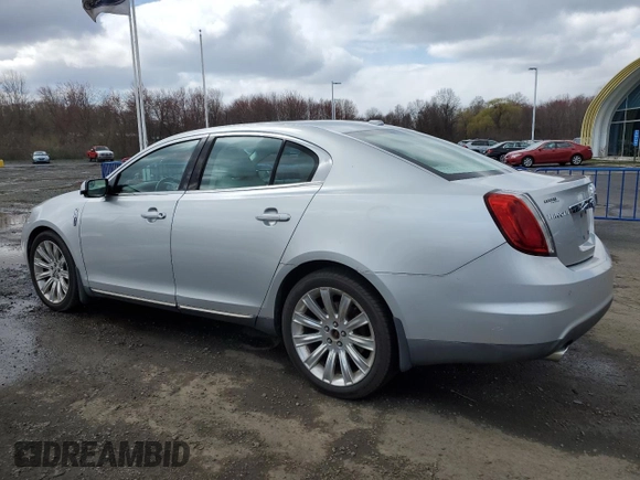 2010 Lincoln MKS EcoBoost with VIN 1LNHL9FT0AG606161, listed as a Copart auction lot 51686965 with 143,188 mi miles and Salvage Title. Bid and sale history available at DreamBid. Image 2.
