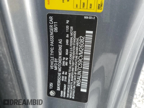 2012 BMW 1 Series 135i with VIN WBAUN7C59CVM26082, listed as a Copart auction lot 74711754 with 77,152 mi miles and Salvage title. Bid and sale history available at DreamBid. Image 13.