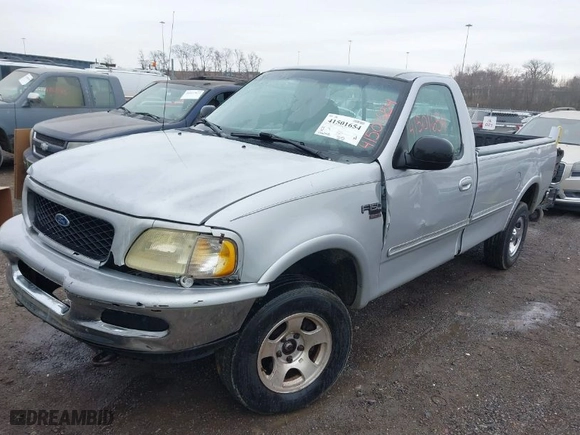 1998 Ford F-150 Standard with VIN 1FTZF18W2WNC27724, listed as a IAAI auction lot 41501654 with 336,342 mi miles. Bid and sale history available at carsss.com. Image 2.