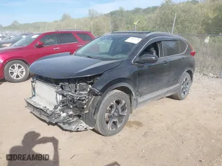 2017 Honda CR-V Touring with VIN 5J6RW2H96HL037854, listed as a IAAI auction lot 40472748 with 126,582 mi miles. Bid and sale history available at carsss.com. Image 17.