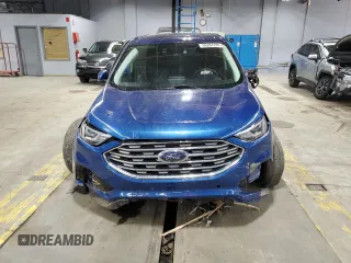 2021 Ford Edge Titanium with VIN 2FMPK4K98MBA18841, listed as a Copart auction lot 56207745 with 69,249 mi miles and Salvage title. Bid and sale history available at DreamBid. Image 5.