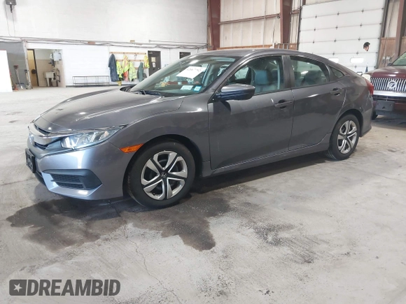 2016 Honda Civic Sedan LX with VIN 19XFC2F58GE214672, listed as a IAAI auction lot 42067792 with 73,929 mi miles. Bid and sale history available at carsss.com. Image 2.
