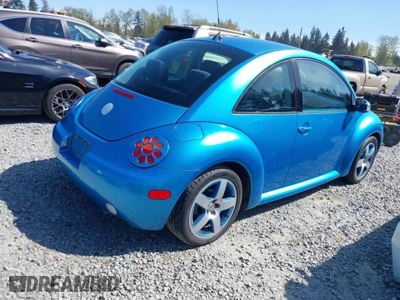 2004 Volkswagen New Beetle Coupe Satellite Blue with VIN 3VWGK31C14M420613, listed as a IAAI auction lot 42046048 with 117,274 mi miles. Bid and sale history available at carsss.com. Image 4.