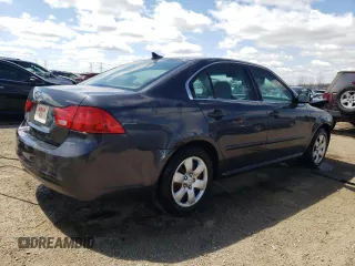 2010 Kia Optima LX z VIN KNAGG4A86A5451165, wystawiony jako Copart lot #52763415 z przebiegiem 213 958 mil mil oraz Szkoda całkowita • Salvage title. Historia ofert i sprzedaży dostępna na DreamBid. Obrazek 3.