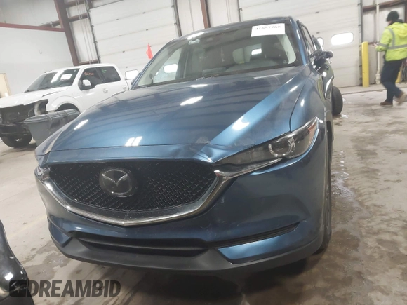 2019 Mazda CX-5 Touring with VIN JM3KFBCM1K0584369, listed as a IAAI auction lot 41657765 with 77,934 mi miles. Bid and sale history available at carsss.com. Image 12.