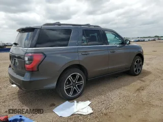 2021 Ford Expedition Limited z VIN 1FMJU2AT1MEA16614, wystawiony jako Copart lot #62007215 z przebiegiem 32 995 mil mil oraz Szkoda całkowita • Salvage title. Historia ofert i sprzedaży dostępna na DreamBid. Obrazek 3.