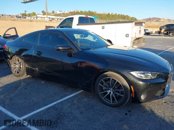2022 BMW 4 Series 430i xDrive with VIN WBA73AP00NCJ16822, listed as a IAAI auction lot 41329235 with 30,570 mi miles and . Bid and sale history available at DreamBid. Image 13.