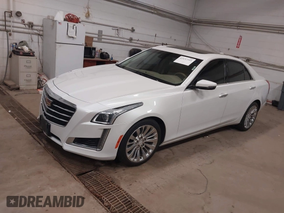 2016 Cadillac CTS Luxury Collection AWD with VIN 1G6AX5SS6G0125285, listed as a IAAI auction lot 42137355 with 110,299 mi miles and . Bid and sale history available at DreamBid. Image 17.