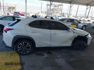 2022 Lexus UX 250h with VIN JTHX9JBH5N2054854, listed as a IAAI auction lot 42009922 with 57,944 mi miles and . Bid and sale history available at DreamBid. Image 13.