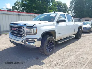 2017 GMC Sierra 1500 SLE with VIN 3GTU2MEC6HG239985, listed as a IAAI auction lot 42542350 with 241,340 mi miles and . Bid and sale history available at DreamBid. Image 17.