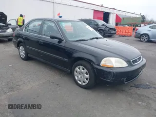 1998 Honda Civic LX with VIN JHMEJ6675WS002154, listed as a IAAI auction lot 41836717 with 150,025 mi miles. Bid and sale history available at carsss.com. Image 1.
