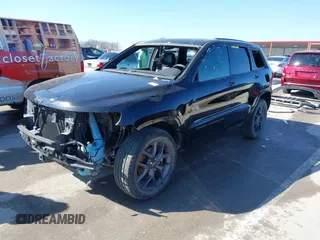 2021 Jeep Grand Cherokee 80th Anniversary with VIN 1C4RJFBG9MC745643, listed as a IAAI auction lot 41729989 with 88,567 mi miles and . Bid and sale history available at DreamBid. Image 2.