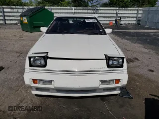 1988 Chrysler Conquest z VIN JJ3CC54N7JZ039025, wystawiony jako Copart lot #66072584 z przebiegiem 79 407 mil mil oraz Szkody całkowita. Historia ofert i sprzedaży dostępna na DreamBid. Obrazek 5.