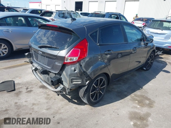 2016 Ford Fiesta SE with VIN 3FADP4EJ6GM191085, listed as a IAAI auction lot 42081402 with 129,106 mi miles and . Bid and sale history available at carsss.com. Image 4.