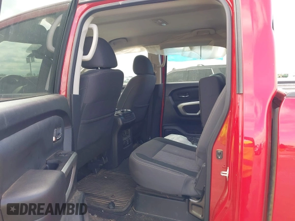 2023 Nissan Titan Pro-4X with VIN 1N6AA1FB9PN104089, listed as a IAAI auction lot 42202488 with 58,151 mi miles and . Bid and sale history available at DreamBid. Image 8.
