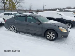 2004 Nissan Maxima SL with VIN 1N4BA41E44C922840, listed as a IAAI auction lot 41233087 with 163,084 mi miles. Bid and sale history available at carsss.com. Image 1.