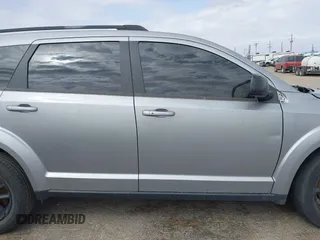 2019 Dodge Journey SE z VIN 3C4PDCBB5KT861358, wystawiony jako IAAI lot #41947841 z przebiegiem 82 099 mil mil oraz . Historia ofert i sprzedaży dostępna na DreamBid. Obrazek 13.
