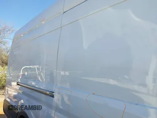 2023 Ford Transit Cargo z VIN 1FTBR3X8XPKA69739, wystawiony jako IAAI lot #41824302 z przebiegiem 67 703 mil mil oraz . Historia ofert i sprzedaży dostępna na DreamBid. Obrazek 6.