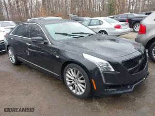 2016 Cadillac CT6 RWD with VIN 1G6KA5RX4GU163954, listed as a IAAI auction lot 41757869 with 107,137 mi miles. Bid and sale history available at carsss.com. Image 1.