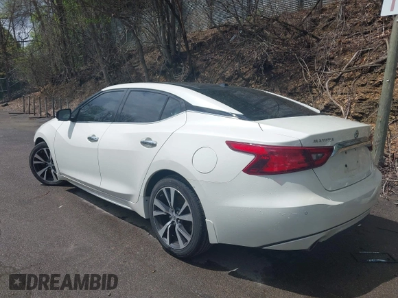 2017 Nissan Maxima SV z VIN 1N4AA6AP3HC434557, wystawiony jako IAAI lot #42203547 z przebiegiem 121 518 mil mil oraz . Historia ofert i sprzedaży dostępna na DreamBid. Obrazek 3.