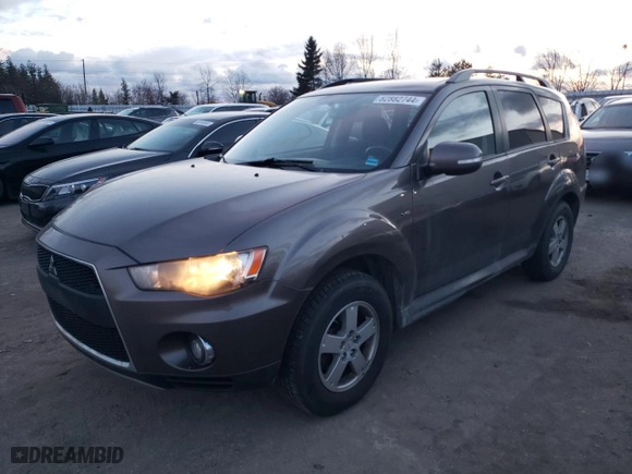 2011 Mitsubishi Outlander LS with VIN JA4JT3AXXBU610616, listed as a Copart auction lot 82882744 with 309,979 mi miles and Clean Title. Bid and sale history available at carsss.com. Image 1.
