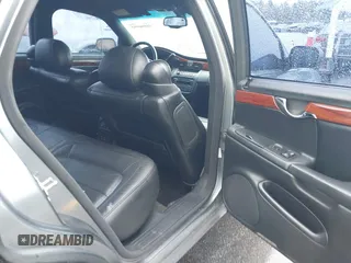 2005 Cadillac DeVille z VIN 1G6KD54Y15U225816, wystawiony jako IAAI lot #41846992 z przebiegiem 134 707 mil mil oraz . Historia ofert i sprzedaży dostępna na DreamBid. Obrazek 8.
