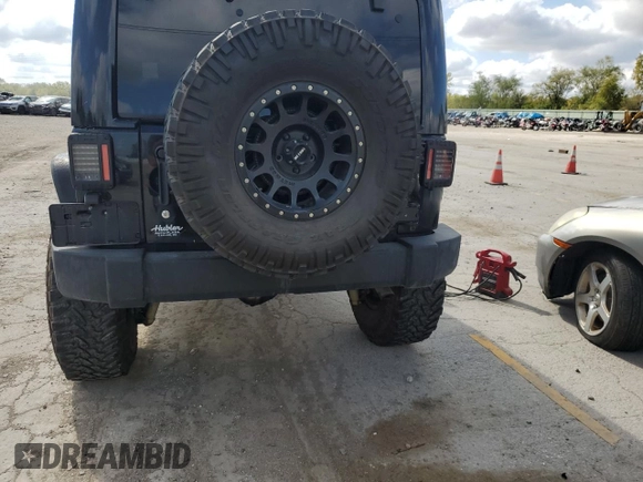 2014 Jeep Wrangler Unlimited Rubicon X с VIN 1C4HJWFG0EL142071, выставлен на аукционе Copart как лот 72898994 с пробегом 110 597 миль миль и Списание • Salvage title. История ставок и продаж доступна на DreamBid. Изображение 6.