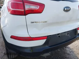 2012 Kia Sportage LX with VIN KNDPB3A24C7317060, listed as a IAAI auction lot 41725826 with 122,574 mi miles. Bid and sale history available at carsss.com. Image 6.