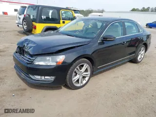 2012 Volkswagen Passat TDI SEL Premium with VIN 1VWCN7A37CC004899, listed as a IAAI auction lot 41791728 with 201,359 mi miles. Bid and sale history available at carsss.com. Image 2.