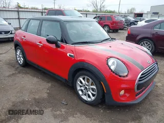 2019 MINI Hardtop 4 Door Cooper with VIN WMWXU1C58K2J02294, listed as a IAAI auction lot 41910654 with 97,887 mi miles and . Bid and sale history available at DreamBid. Image 1.