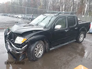2011 Nissan Frontier Pro-4X with VIN 1N6AD0EV5BC440663, listed as a IAAI auction lot 41923918 with 168,331 mi miles and . Bid and sale history available at DreamBid. Image 17.