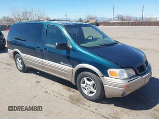 1999 Pontiac Montana with VIN 1GMDX03E0XD166084, listed as a IAAI auction lot 41872976 with 196,027 mi miles and . Bid and sale history available at DreamBid. Image 1.