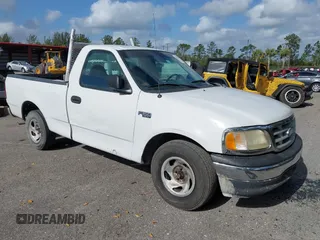 1999 Ford F-150 with VIN 1FTZF1729XKB56992, listed as a IAAI auction lot 42112335 with 230,061 mi miles and . Bid and sale history available at DreamBid. Image 1.