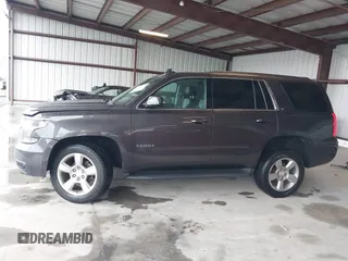 2017 Chevrolet Tahoe LT with VIN 1GNSKBKC8HR326004, listed as a IAAI auction lot 42256494 with 101,486 mi miles and . Bid and sale history available at DreamBid. Image 15.