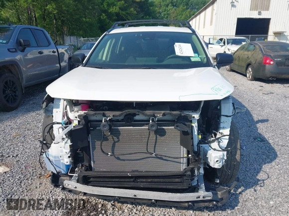 2023 Toyota RAV4 Hybrid LE with VIN JTMLWRFV3PD188020, listed as a IAAI auction lot 42424244 with 69,863 mi miles and . Bid and sale history available at DreamBid. Image 12.