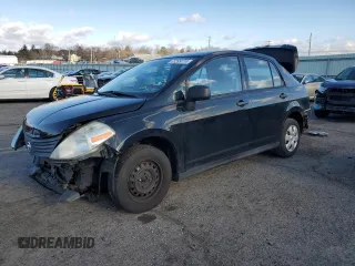 2010 Nissan Versa 1.6 with VIN 3N1CC1AP9AL352264, listed as a Copart auction lot 87299774 with 147,472 mi miles and Salvage Title. Bid and sale history available at carsss.com. Image 1.