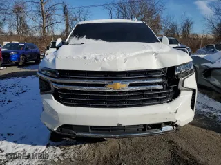 2021 Chevrolet Suburban LT with VIN 1GNSKCKD4MR401404, listed as a Copart auction lot 86254504 with 79,317 mi miles and Salvage Title. Bid and sale history available at carsss.com. Image 5.