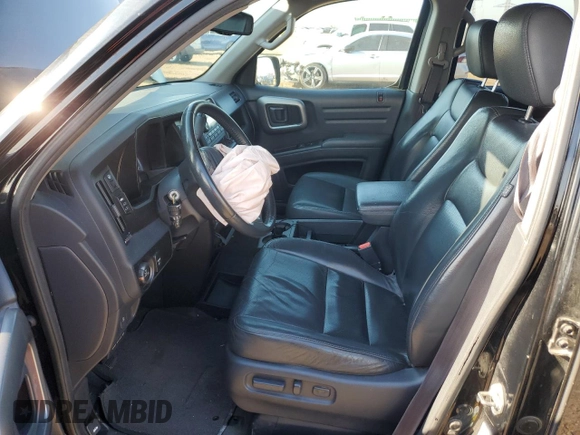 2013 Honda Ridgeline RTL z VIN 5FPYK1F52DB004376, wystawiony jako Copart lot #55990375 z przebiegiem 127 762 mil mil oraz Szkoda całkowita • Salvage title. Historia ofert i sprzedaży dostępna na DreamBid. Obrazek 7.