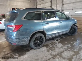 2021 Honda Pilot Special Edition with VIN 5FNYF6H28MB009000, listed as a IAAI auction lot 41597743 with 57,272 mi miles. Bid and sale history available at carsss.com. Image 4.