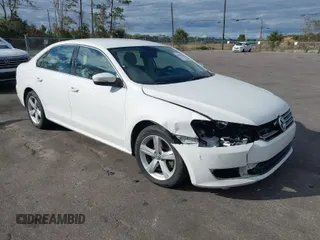 2013 Volkswagen Passat SE w/Sunroof with VIN 1VWBH7A30DC080176, listed as a IAAI auction lot 40941070 with 155,815 mi miles. Bid and sale history available at carsss.com. Image 1.