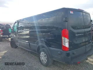 2018 Ford Transit Passenger XL z VIN 1FBZX2YM5JKA57441, wystawiony jako IAAI lot #41257346 z przebiegiem 71 702 mil mil oraz . Historia ofert i sprzedaży dostępna na DreamBid. Obrazek 3.